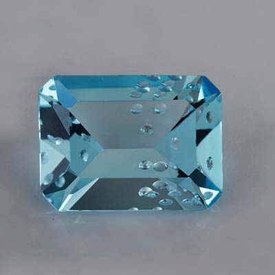 Natural 16x12x7.7mm Faceted Octagon Topaz