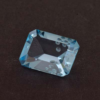 Natural 16x12x7.2mm Faceted Octagon Topaz