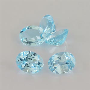 Natural 9x7x4.7mm Faceted Oval Topaz